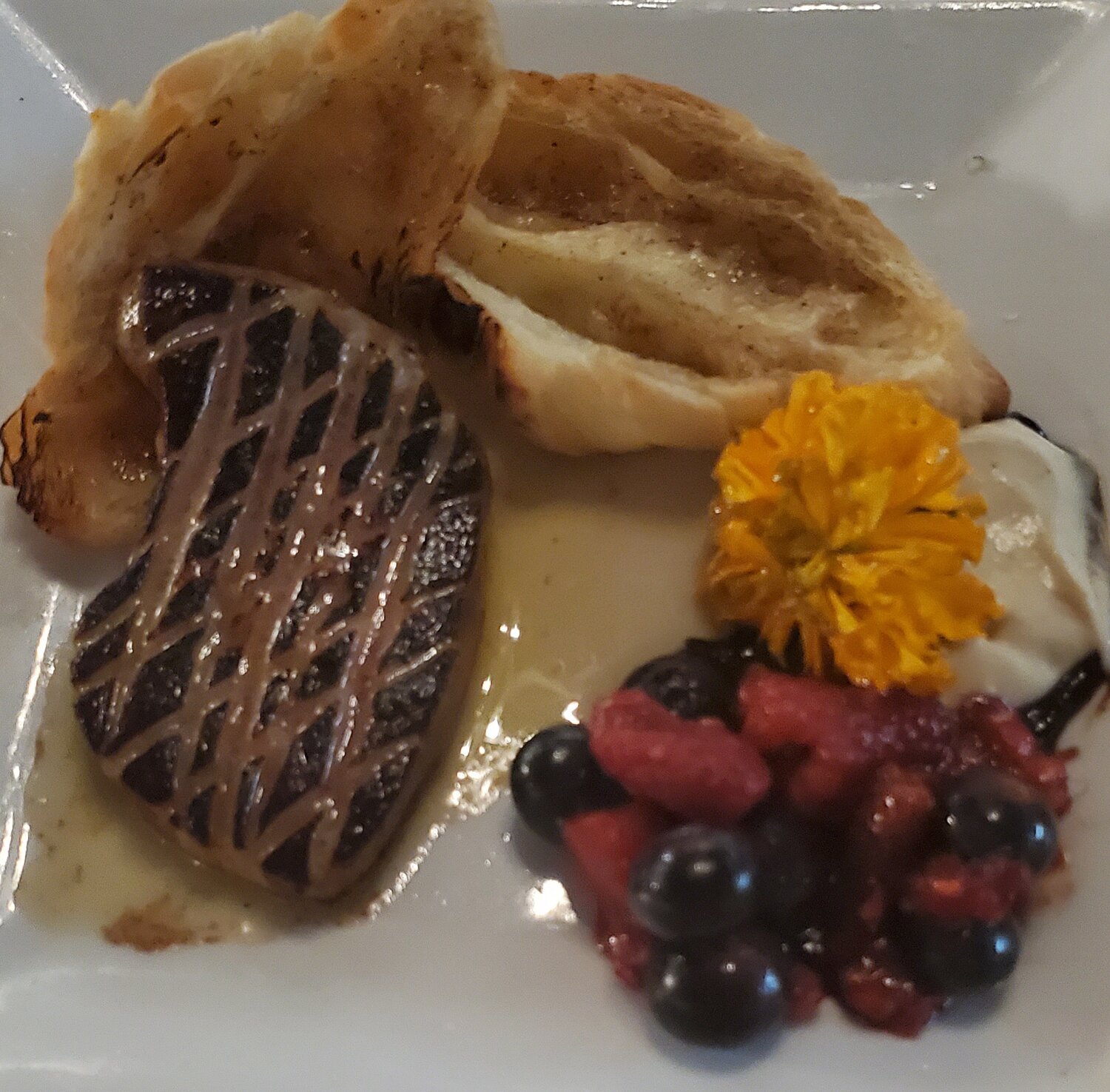 Foie Gras en Croissant — Apple bourbon butter, macerated berries, earl grey anglaise, mission fig balsamic
